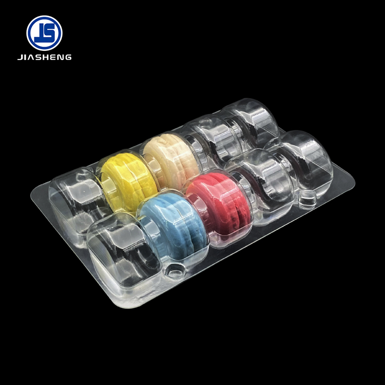 Clear macaron insert with eight molded cavities produced from an existing mold
