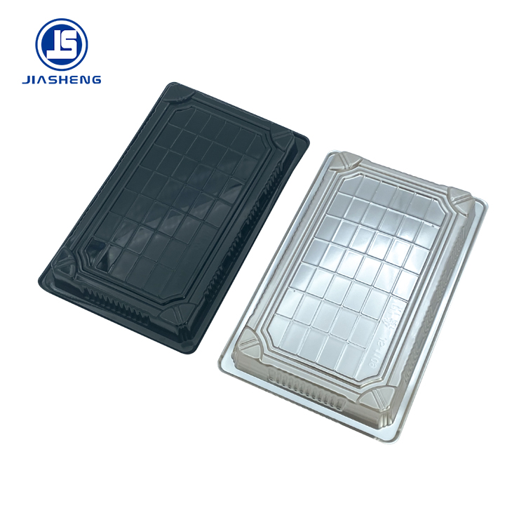 Black and silver sushi tray bases &mdash; dark colors can be invisible to NIR sorting