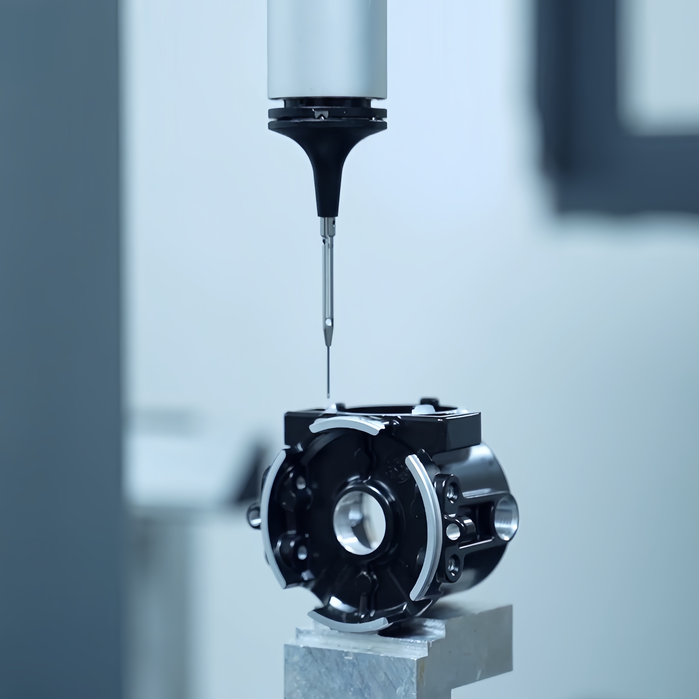 Engineer inspecting precision machined components with measuring equipment at SUNPREC