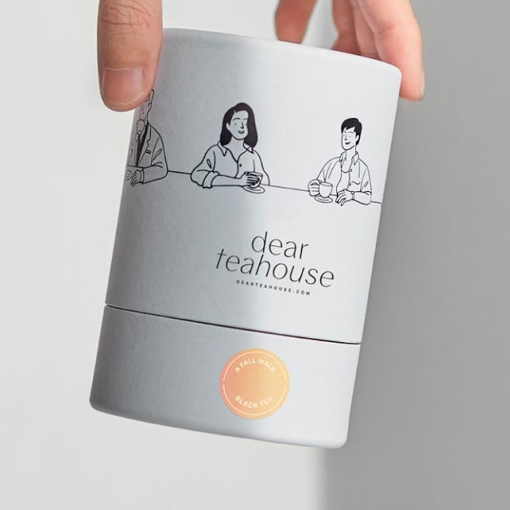 Premium branded paper tube with refined surface finish and minimalist design for luxury product packaging
