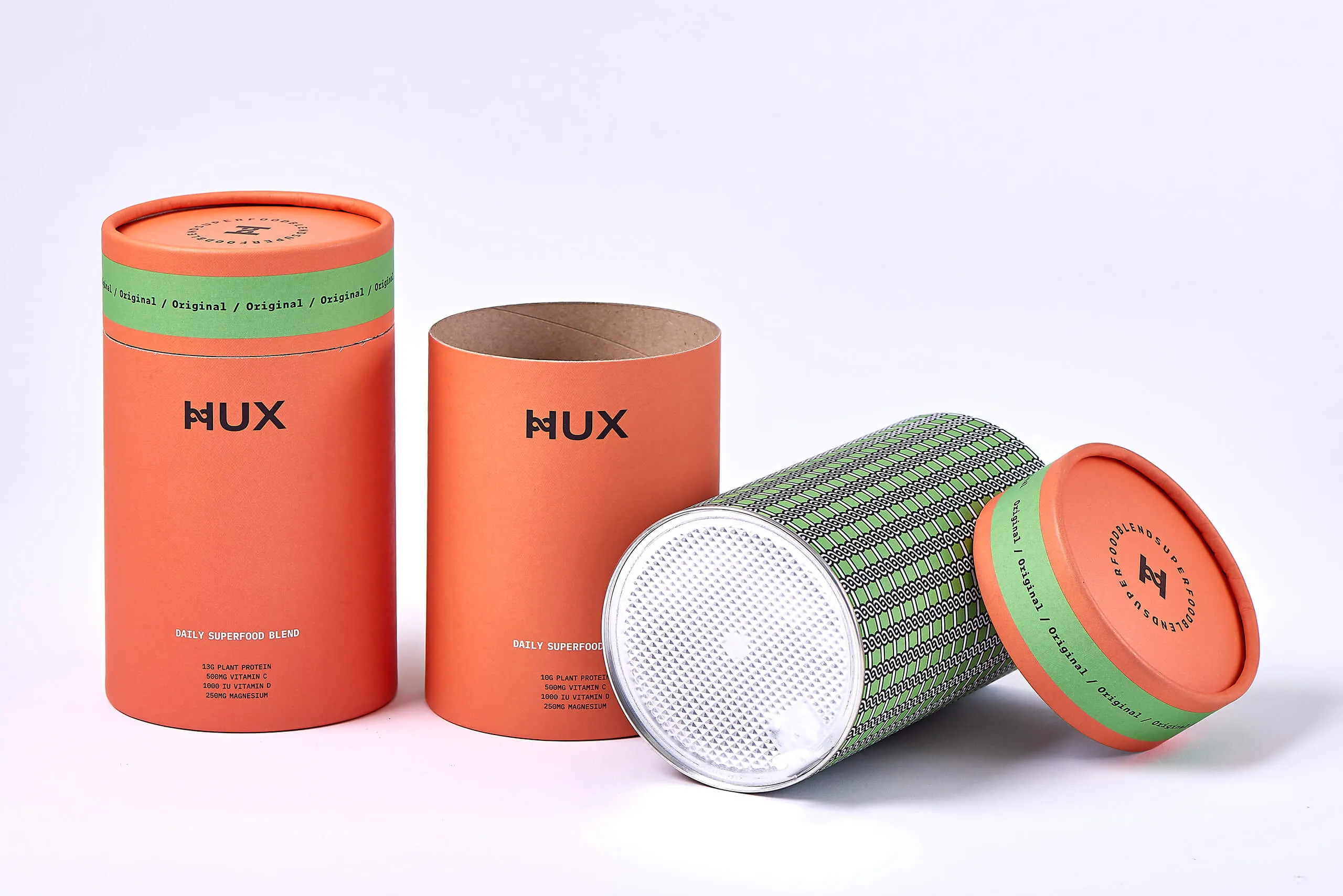 branded supplement paper tube packaging for a wellness product line
