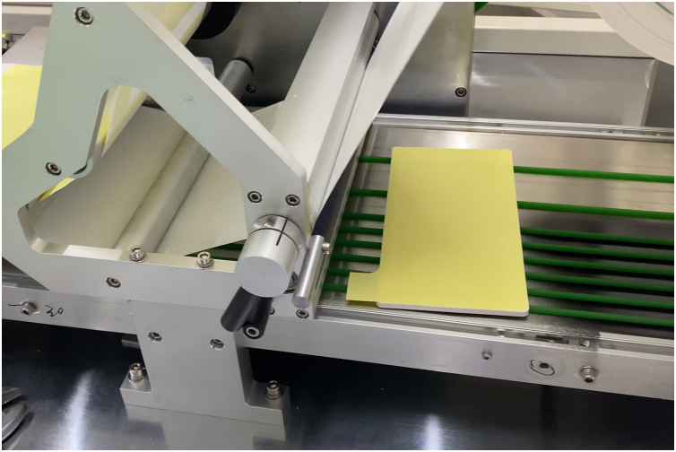Double-sided adhesive laminating