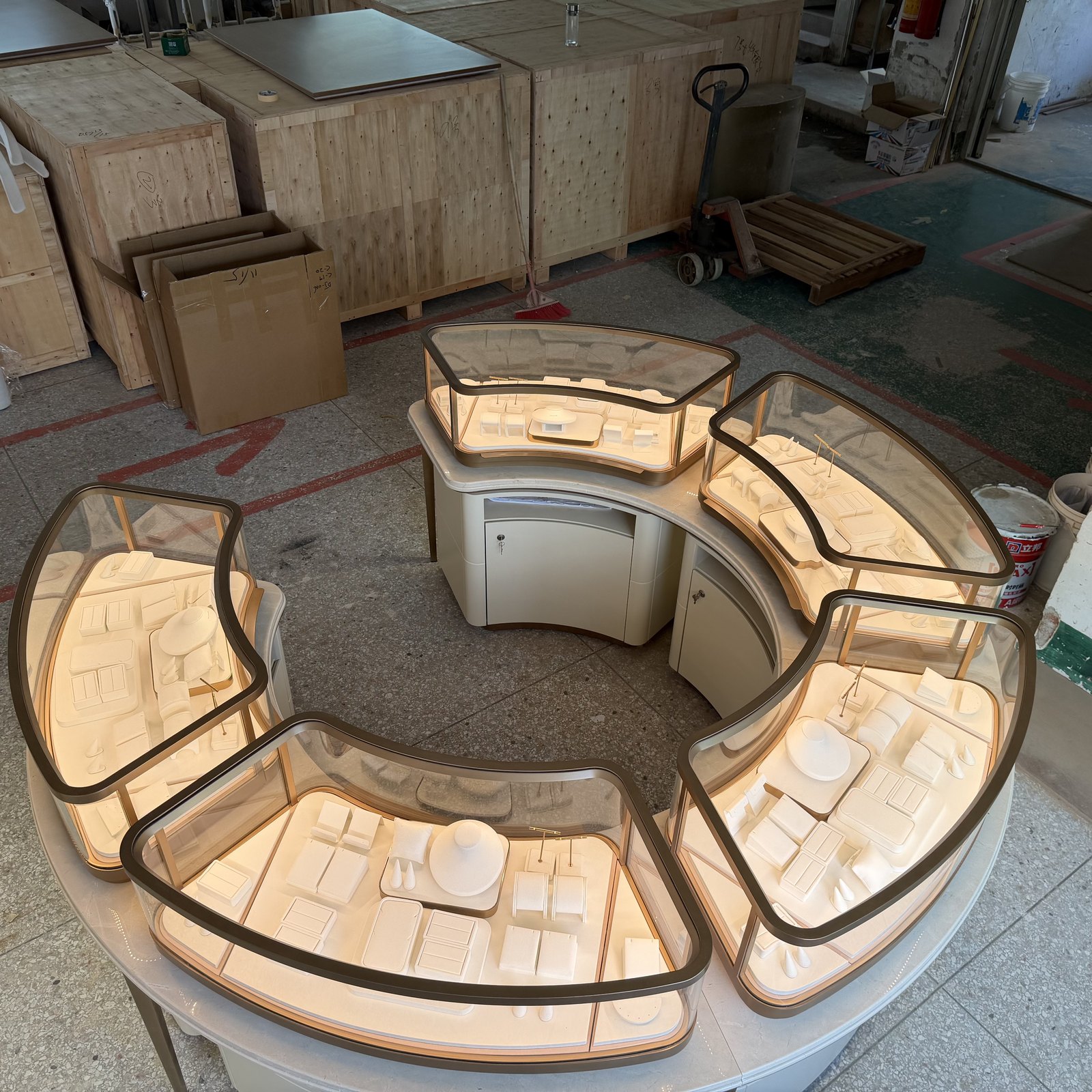 Several curved jewelry showcase types laid out together for a store fixture schedule