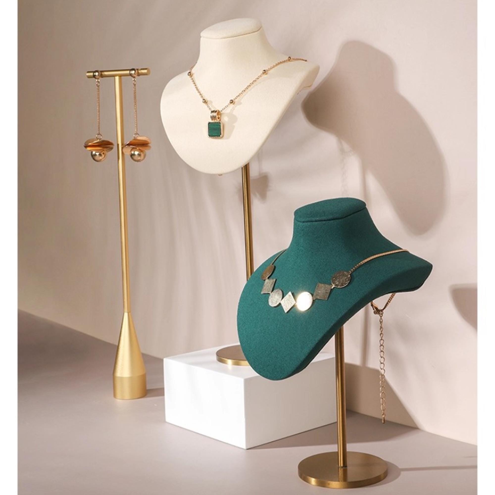 Display props visually synchronized with custom jewelry showcases — Pantone-matched leather and velvet