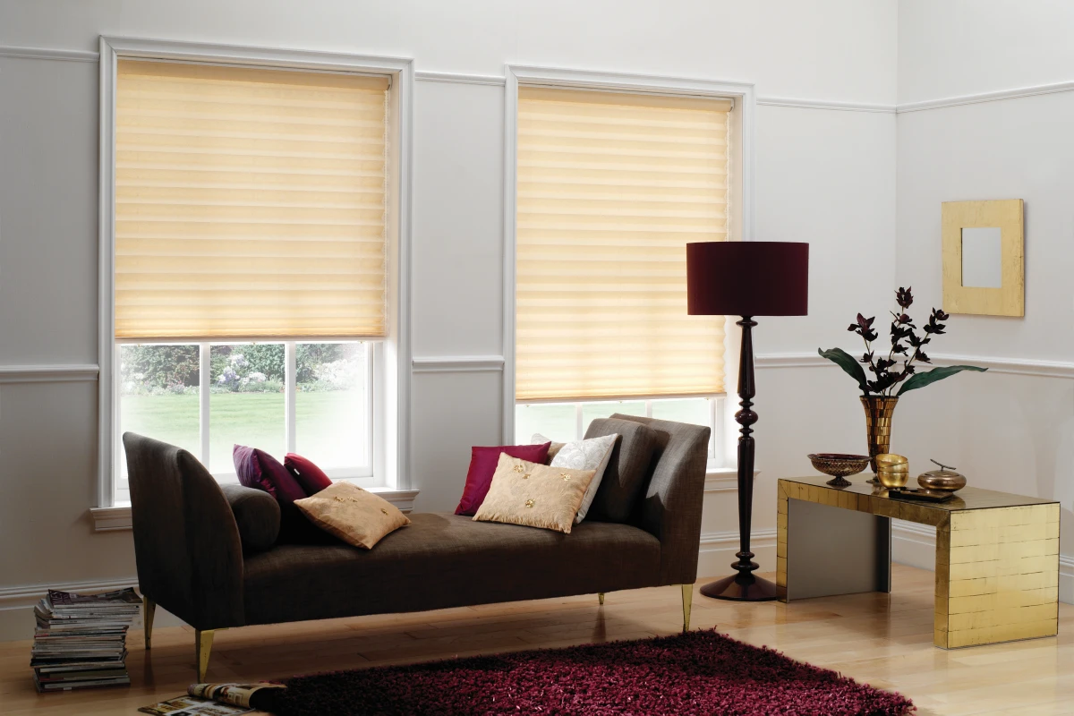 cellular shades in the sofa table living room area